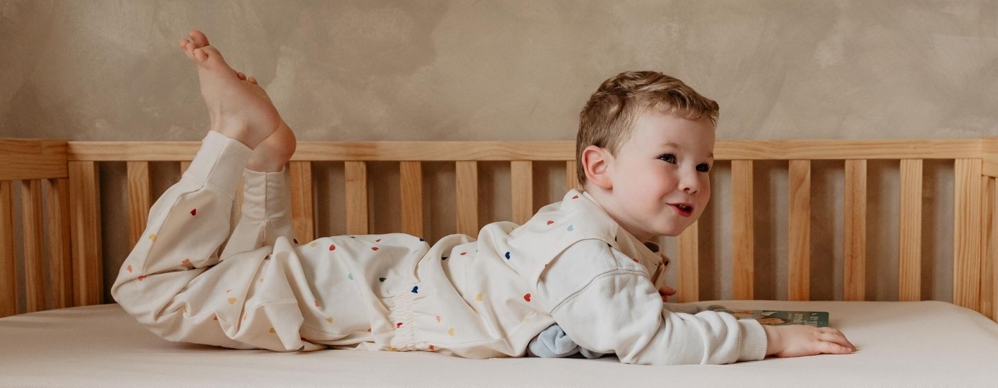 newborn baby in a piep sleeping bag