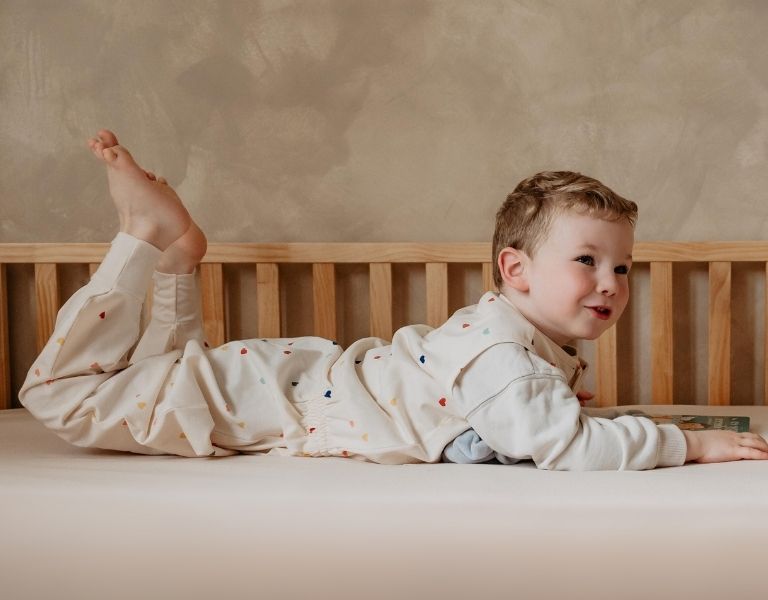 newborn baby in a piep sleeping bag